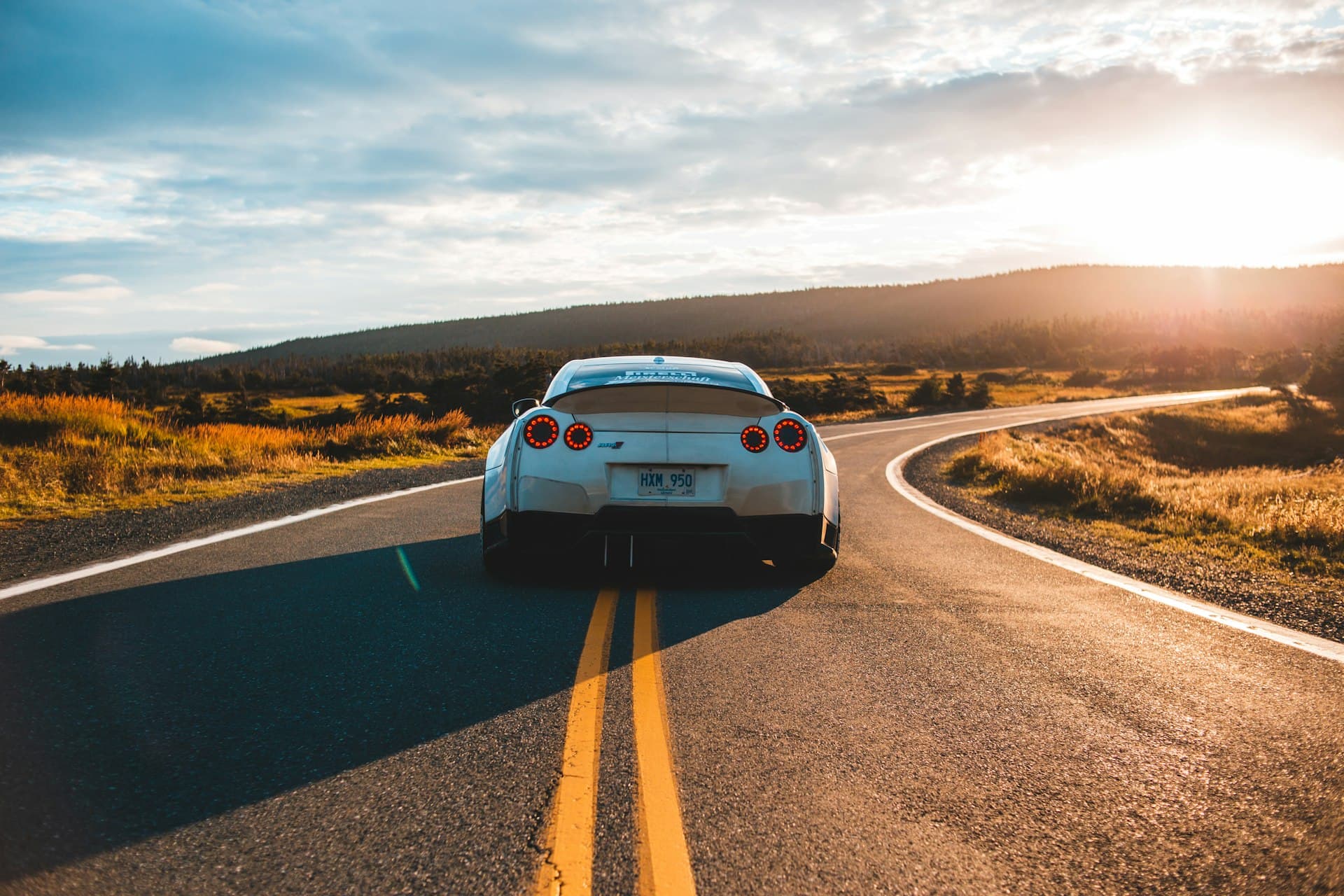Background image of a car on a road